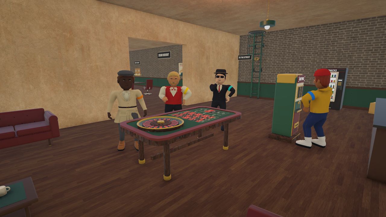 Crew members at the roulette table and slot machine in the casino